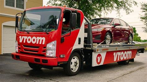 who owns vroom auto sales.
